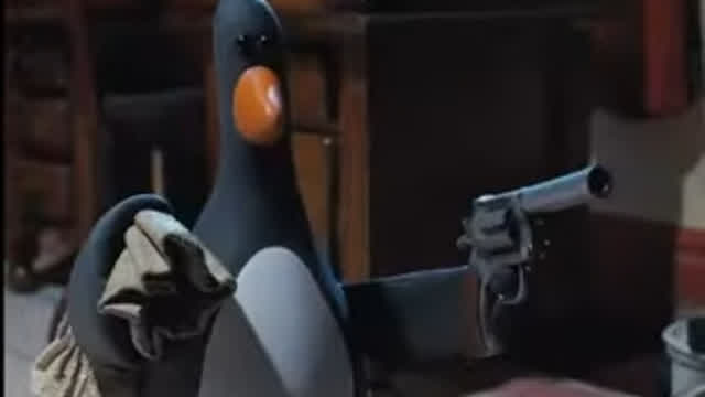 Feathers McGraw Points a Gun at Gromit