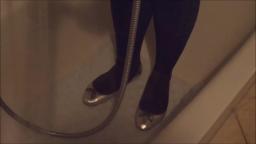 Jana goes into mud flat with her silver flats ballerinas and wash after them in shower trailer